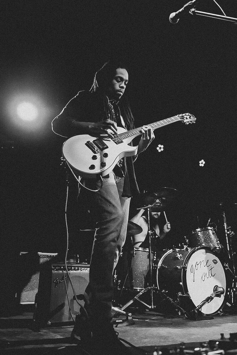Black and white photo of rhythm guitarist. Band is &quot;El Paladin&quot;